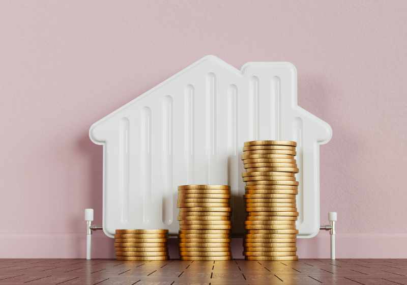 Household energy bills concept. Heating radiator in the shape of a house with a stack of coins. 3D Rendering.